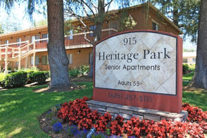 Heritage Park exterior with Heritage Park Senior Apartments 55+ (626) 357-5118 outdoor sign